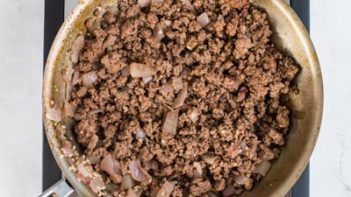 ground beef cooking in a skillet