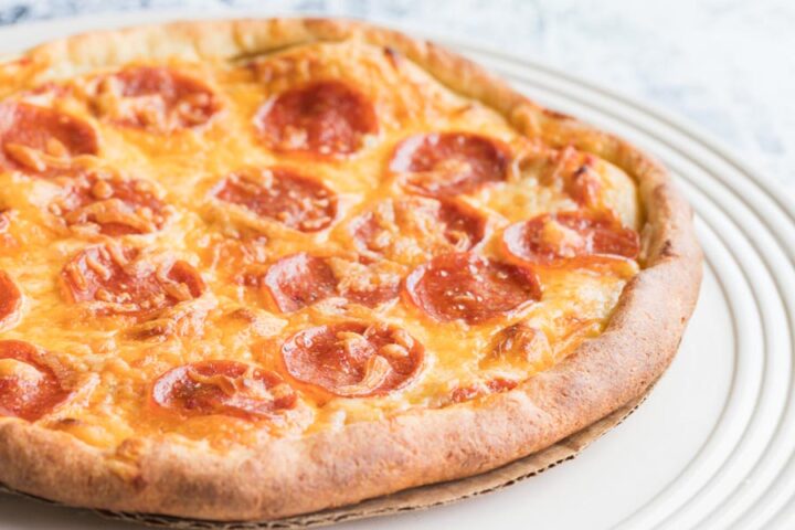 a baked pepperoni pizza on a homemade low-carb crust
