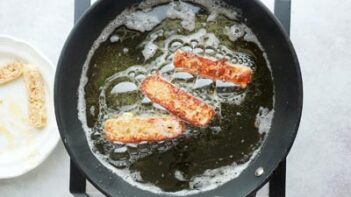 frying french toast in a skillet with avocado oil bubbling