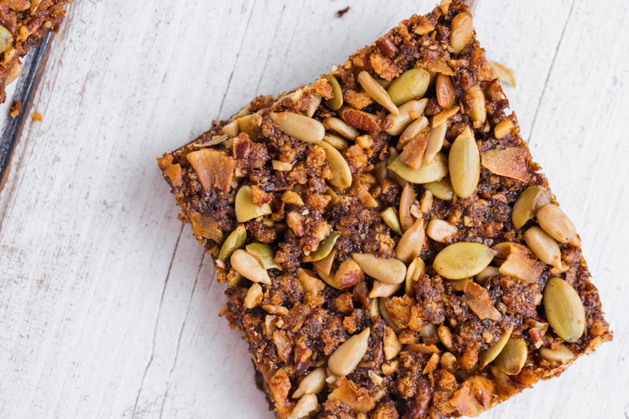 a square nut bar on a wooden table