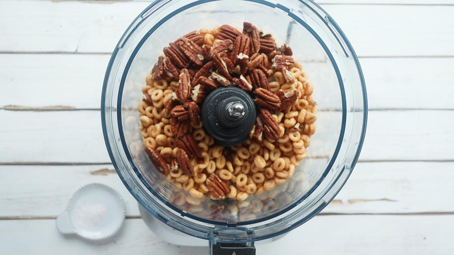keto cereal and pecans in a food processor