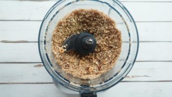 ground up cereal and nut mixture in a food processor