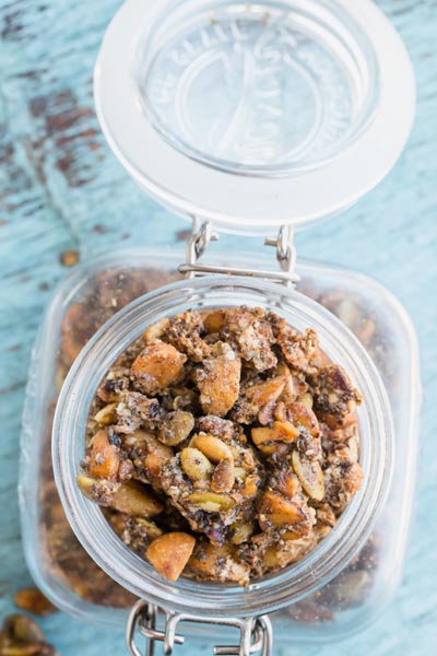 A mason jar with homemade granola inside.