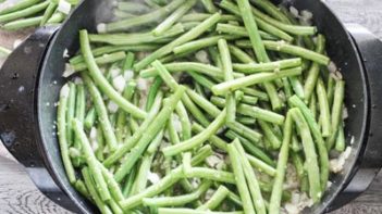green beans cooking in a skillet