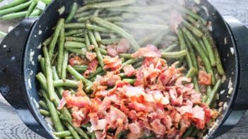 crispy bacon added on top of green beans