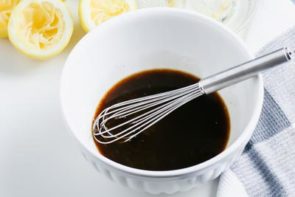 worcestershire sauce in a bowl with a wire whisk