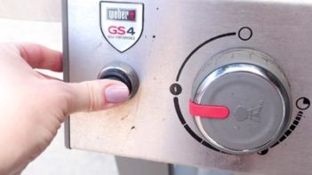 turning on a gas grill to heat up to high