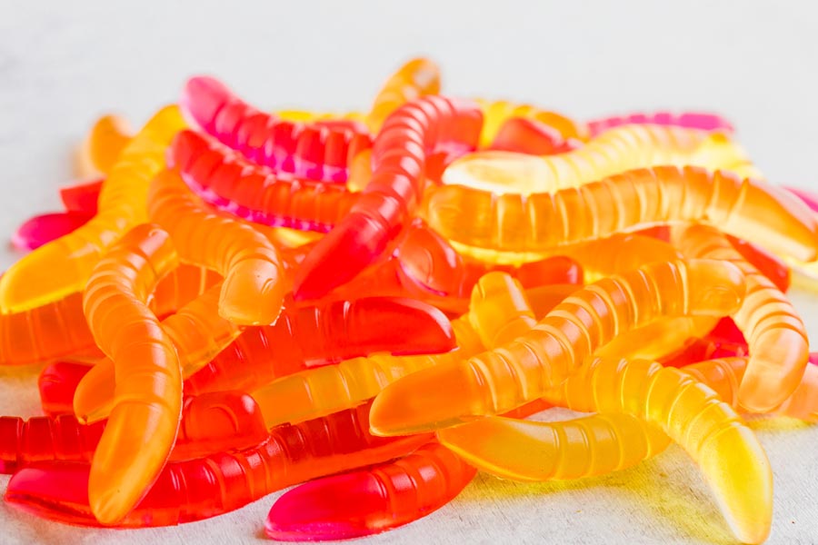 a pile of gummy worms on top of each other
