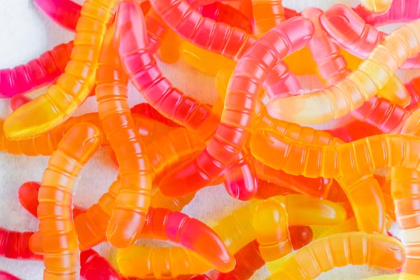 jello gummy worms in a pile