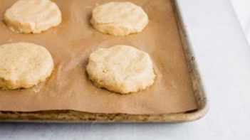 buns molded on a parchment lined baking tray