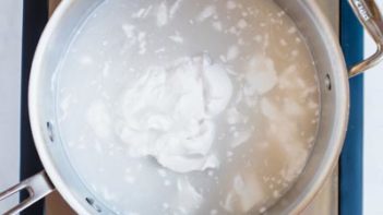 combining milk and sweeteners for hot cocoa