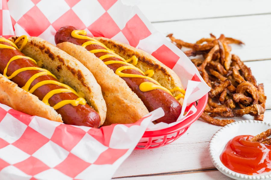 a basket of two keto hot dogs with jicama fries on the side