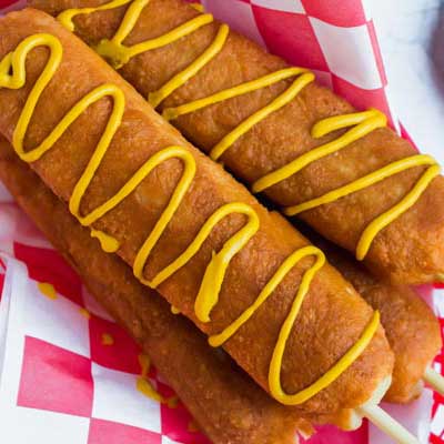 Keto appetizers represented by a keto corn dog