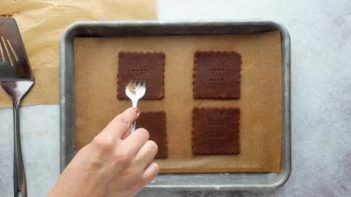 pricking cookie cut outs with a fork