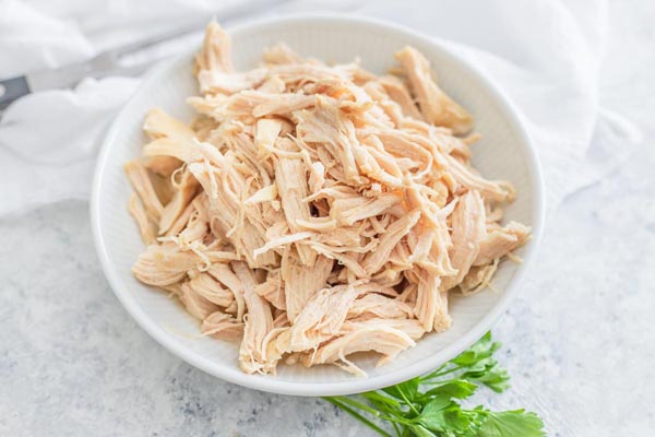 a bowl of shredded chicken