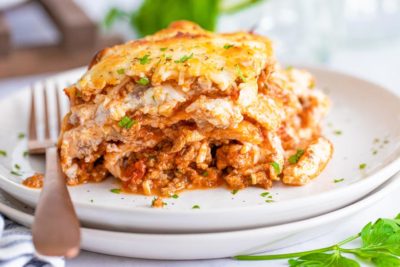 keto lasagna layers on a plate with a fork