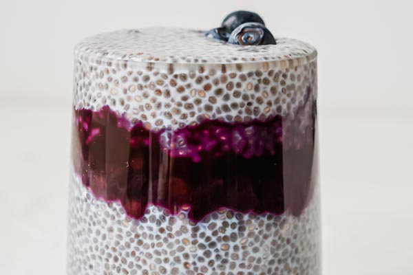 close up of the three layers in a bowl of chia pudding