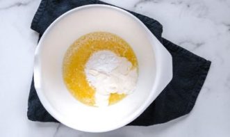 butter and cream cheese in a microwave safe bowl