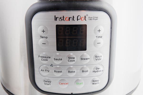 the face of an instant pot pressure cooker with all the buttons