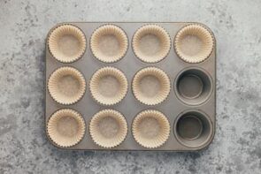 Cupcake liners in a muffin tray.