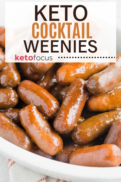 A bowl of keto cocktail weenies covered in grape bbq sauce with text that reads 'keto cocktail weenies".