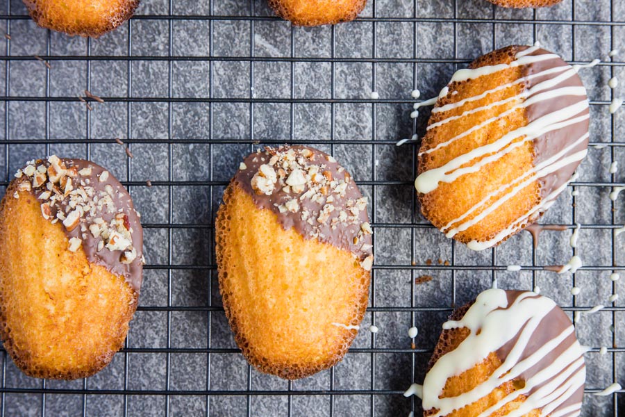 cookies on a wire rack decorated beatuifully