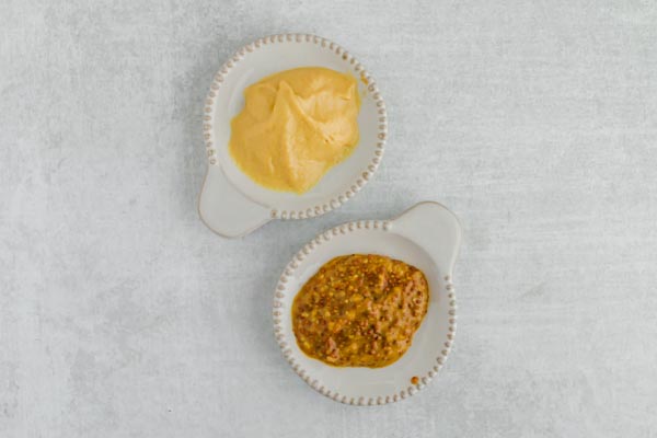 mustards in small dishes