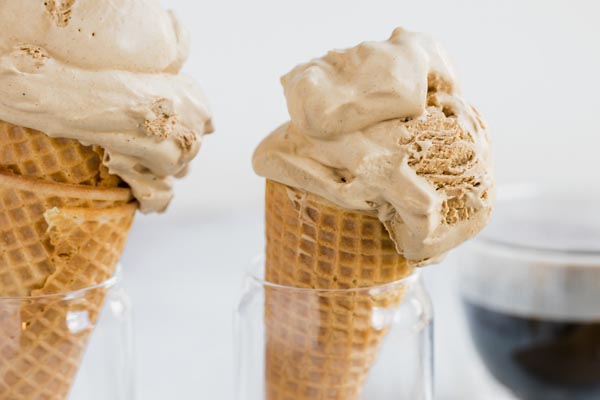 close up of creamy coffee ice cream in cones