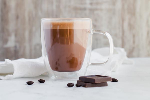 ice mocha on table with chocolate ascents