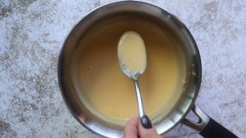 a spoonful of thick nacho cheese sauce