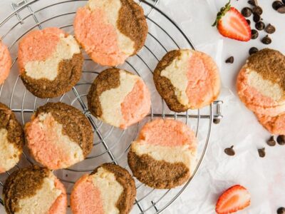 overhead shot of a bunch of neapolitan cookies cooling on a wire rack
