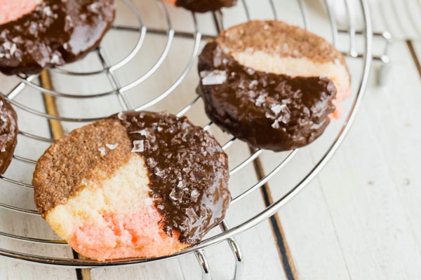 neapolitan cookies half dipped in dark chocolate