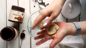 molding a chocolate chip cookie in your hands
