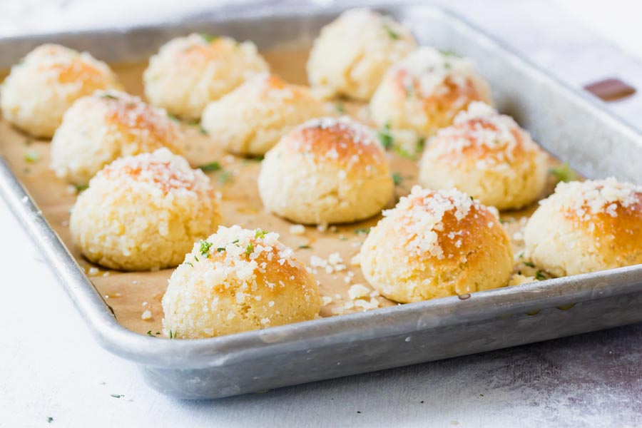 a small tray with puff rolls on it