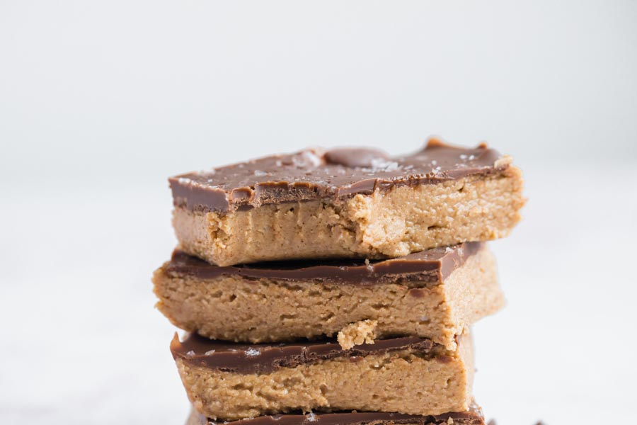 close up of a bite taken out of the top peanut butter bar