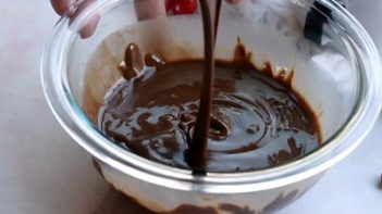 melted chocolate pouring into a bowl
