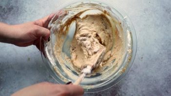 mixing peanut butter filling with a spatula