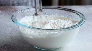 beating whipped cream with a mixer