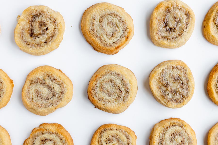 pinwheel shaped cookies lined up in rows