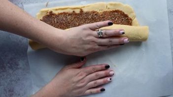 rolling cookie dough into a log