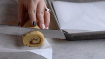 slicing cookie dough with a knife