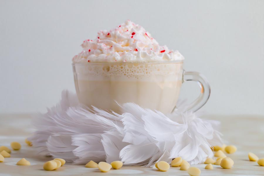 peppermint white hot chocolate sitting on feathers