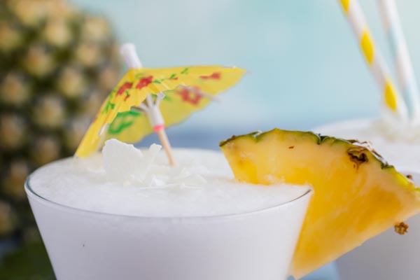 umbrella drink with a pineapple wedge