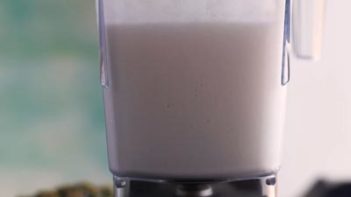 blended pina colada in a blender