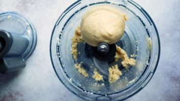 a ball of dough in a food processor