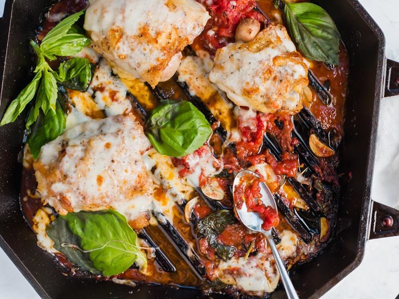 keto pizza chicken in a cast iron skillet