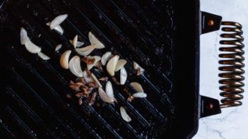 sauting garlic and anchovy in a cast iron skillet