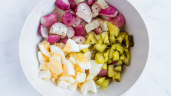 Keto potato salad radishes cut up and ready for the oven.