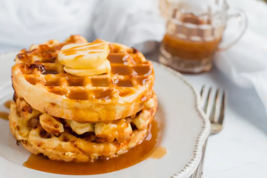 a plate of protein chaffles with syrup