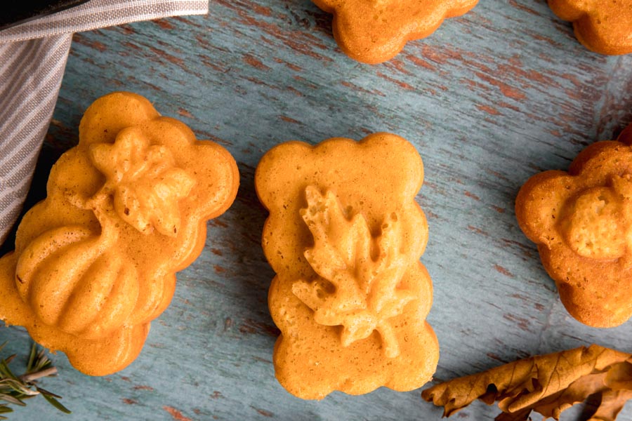 two decorated Fall pumpkin bread loaves